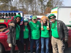 Transitions Centers staff members in Saint Patricks Day green for parade